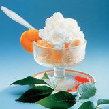 Cup of fruit with whipped cream