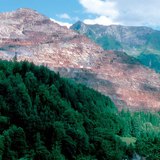 Open-cast iron ore mine in the Alps