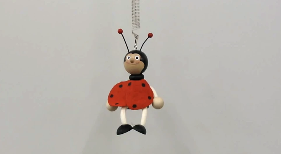 Oscillation of a toy on a spring (basic)